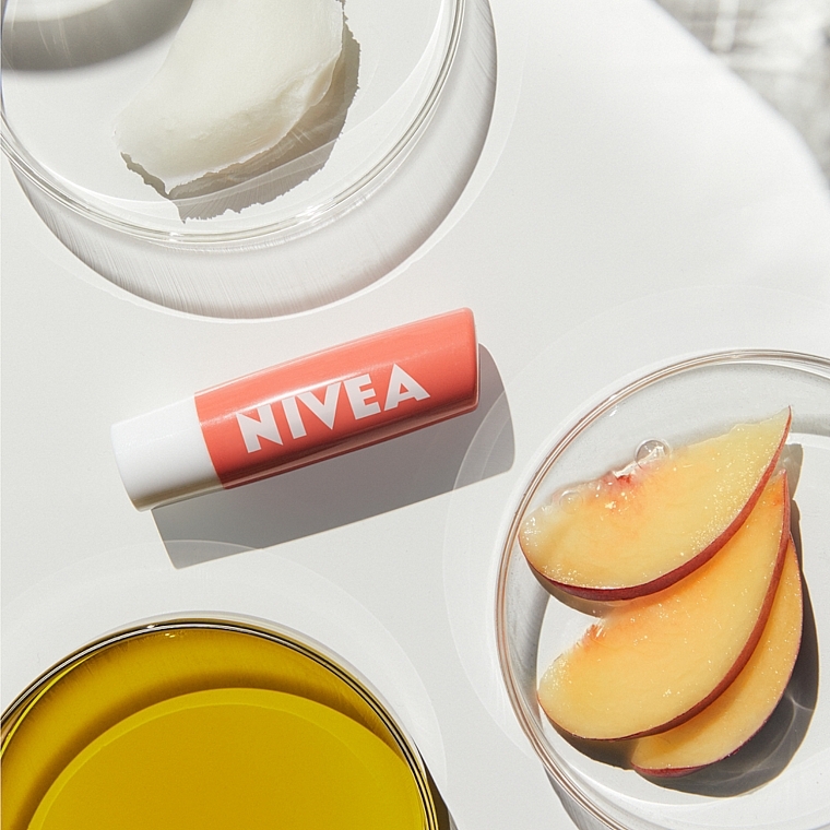 Feuchtigkeitsspendender Lippenbalsam Peach Shine - Nivea Lip Care Peach Shine Lip Balm — Bild N9