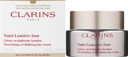 Düfte, Parfümerie und Kosmetik Pflegende und revitalisierende Tagescreme - Clarins Nutri-Lumiere Day Cream