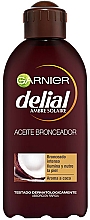 Intensives Bräunungsöl mit Kokosnussduft - Garnier Delial Ambre Solaire Intense Suntan Coco Oil — Bild N1