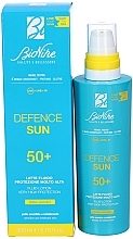 Flüssige Körperlotion mit Sonnenschutz - BioNike Defence Sun SPF50+ Fluid Lotion Water Resistant — Bild N2