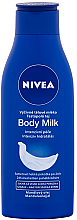 Düfte, Parfümerie und Kosmetik Nährende Körpermilch für trockene Haut mit Mandelöl - NIVEA Body Milk