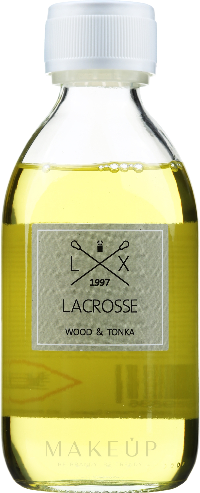 Nachfüller für Raumerfrischer Holz und Bohnen Tonka - Ambientair Lacrosse Wood & Tonka — Bild 250 ml