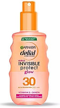 Düfte, Parfümerie und Kosmetik Sonnenschutzspray - Garnier Delial Ambre Solaire Invisible Protect Glow SPF30 Spray
