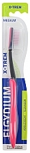 Zahnbürste für Teenager X-Trem mittel rosa - Elgydium X-Trem Medium Toothbrush — Bild N1