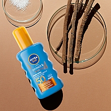 Schutzspray nach dem Sonnenbad - Nivea Sun Protect & Bronze SPF50 Double Action Spray — Bild N3