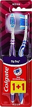 Zahnbürste mittel Zick Zack Plus blau, violett 2 St. - Colgate Zig Zag Plus Medium — Bild N1