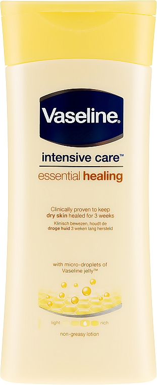 Feuchtigkeitsspendende Heillotion für sehr trockene Körperhaut - Vaseline Intensive Care Essential Healing Lotion — Foto N1