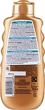 Bräunende Körperlotion - Garnier Ambre Solaire Natural Bronzer Self Tan Lotion — Bild N2