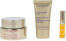 Set - Clarins Nutri-Lumiere Set (day/cr/50ml + night/cr/15ml + lip/oil/2.8ml) — Bild N2