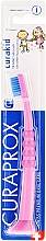 Kinderzahnbürste ultra weich Curakid rosa-blau - Curaprox — Bild N2