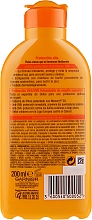 Feuchtigkeitsspendende Sonnenschutzmilch SPF 30 - Garnier Ambre Solaire Delial Protective Moisturizing Milk SPF30 — Bild N2