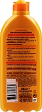 Sonnenschutzmilch SPF 20 - Garnier Ambre Solaire Waterproof Protection Lotion SPF 20 — Bild N4
