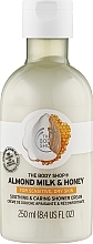 Beruhigende und pflegende Duschcreme mit Mandelmilch und Honig für trockene und empfindliche Haut - The Body Shop Almond Milk & Honey Soothing & Caring Shower Cream — Bild N1