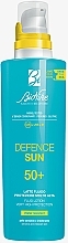 Düfte, Parfümerie und Kosmetik Flüssige Körperlotion mit Sonnenschutz - BioNike Defence Sun SPF50+ Fluid Lotion Water Resistant