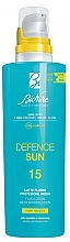 Düfte, Parfümerie und Kosmetik Flüssige Körperlotion mit Sonnenschutz - BioNike Defence Sun SPF15 Fluid Lotion Water Resistant