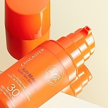 Sonnenschutz-Gesichtsfluid - Lancaster Sun Beauty Nude Skin Sensation Sun Protective Fluid SPF30 — Bild N4