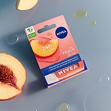 Feuchtigkeitsspendender Lippenbalsam Peach Shine - Nivea Lip Care Peach Shine Lip Balm — Foto N5