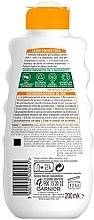 Sonnenschutzmilch SPF 20 - Garnier Ambre Solaire Waterproof Protection Lotion SPF 20 — Bild N2