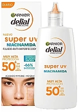 Düfte, Parfümerie und Kosmetik Gesichts- und Augencreme - Garnier Delial Super UV Niacinamide Spf50