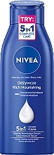 Düfte, Parfümerie und Kosmetik Pflegende und feuchtigkeitsspendende Körpermilch mit Vitamin E - NIVEA Nourishing Body Milk