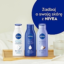 Pflegende und feuchtigkeitsspendende Körpermilch mit Vitamin E - NIVEA Nourishing Body Milk — Bild N8