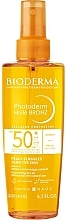 Trockenes Sonnenschutzöl für den Körper SPF 50+ - Bioderma Photoderm Bronz Dry Oil SPF 50+ — Bild N2