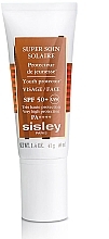 Gesichts- und Körperpflegeset - Sisley Travel Essentials (Sonnenschutzcreme für das Gesicht SPF50 40ml + Sonnenschutzcreme für den Körper SPF30 50ml + Kosmetiktasche) — Bild N2