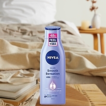 Verwöhnende Körpermilch für trockene Haut - NIVEA Smooth Sensation Body Soft Milk — Bild N8