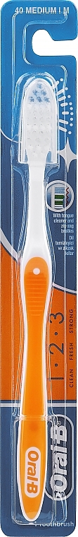 Zahnbürste 40 mittel orange mit Kappe - Oral-B 1 2 3 Classic 40 Medium — Bild N1